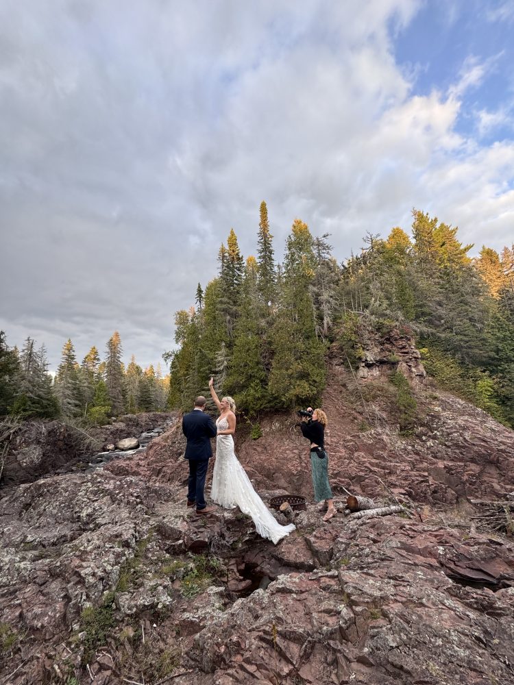 Trisha with Xsperience Photography photographing a wedding at Tettegouche Lodge